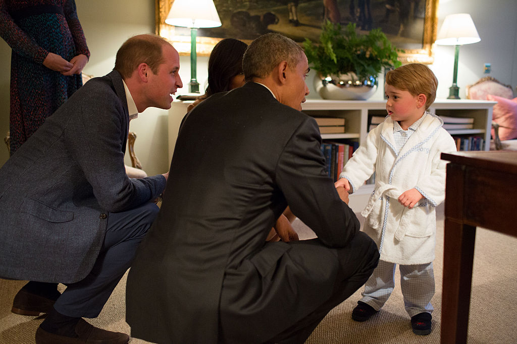 Il principe George saluta Barack e Michelle Obama