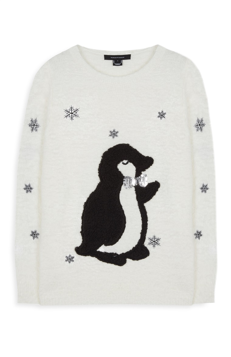 Maglioni natalizi Primark, con stampa pinguino e stelle, 18 euro.